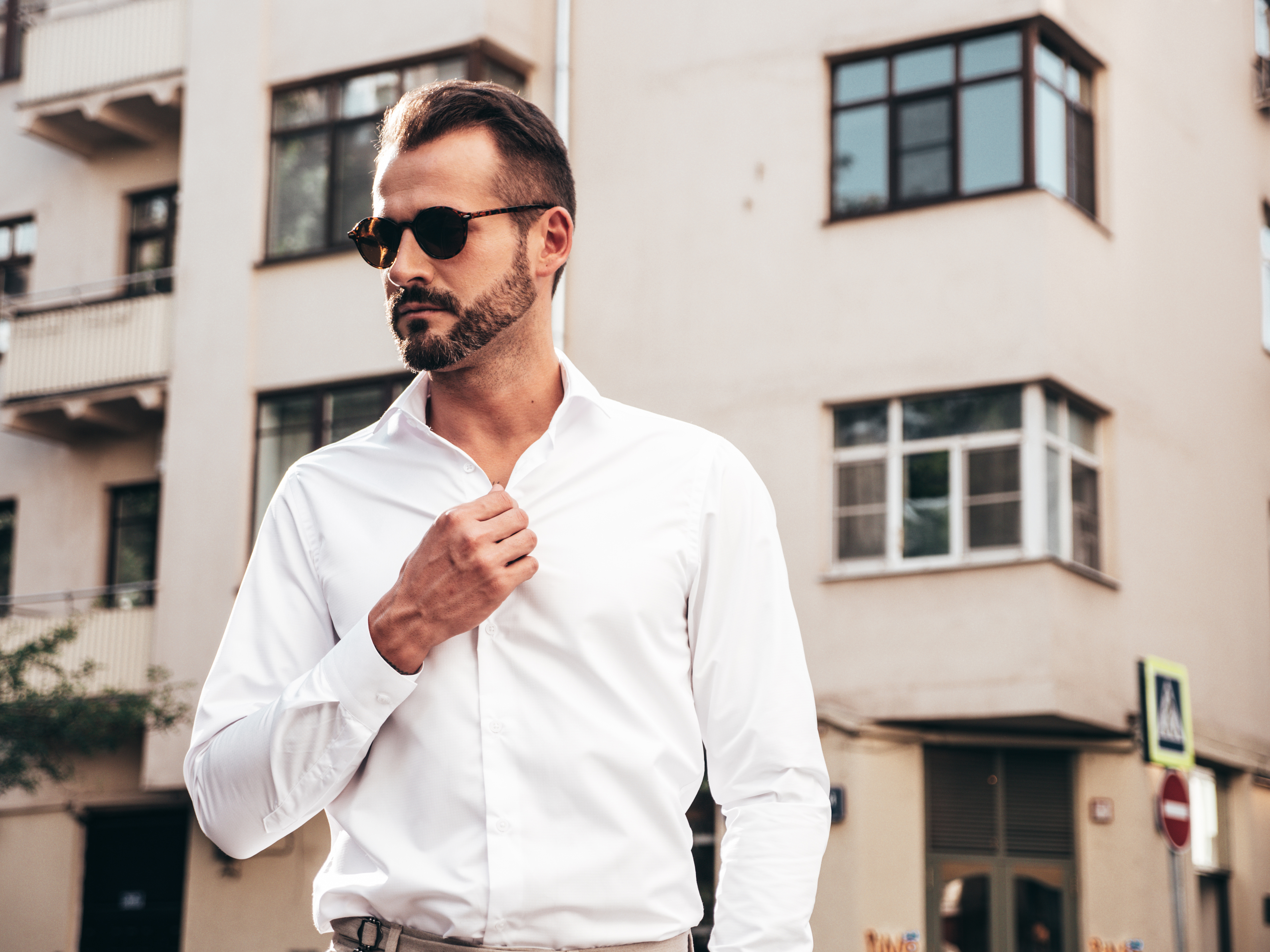 Handsome man posing in the street